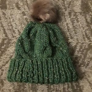 Cable knitted hat with fur pompom